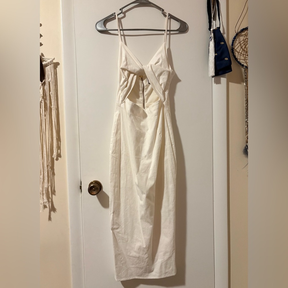Chic Cream Midi Dress with Unique Cutout Design